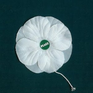 White poppy with peace in the centre